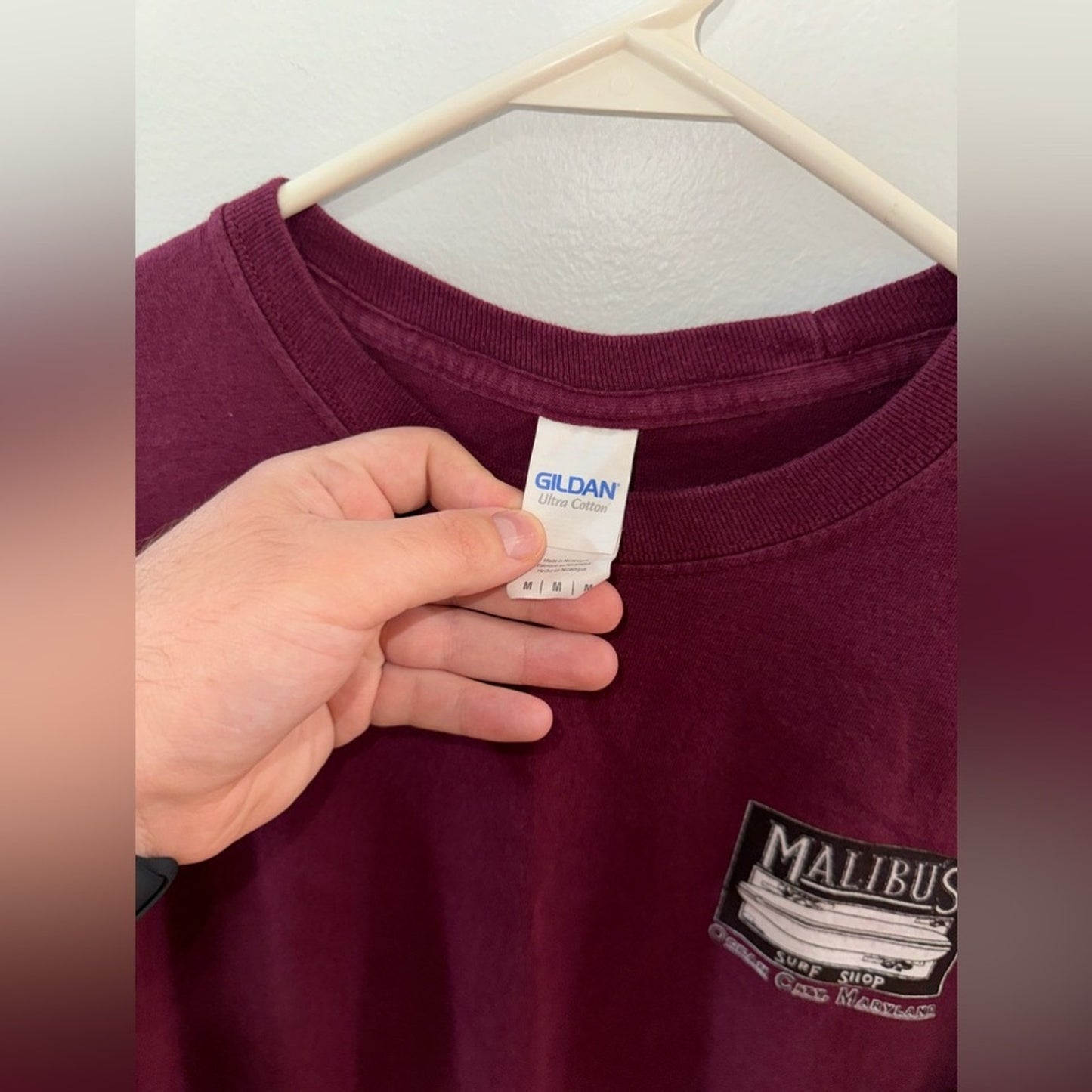 MD Unisex Malibu’s Surf Shop Maroon Surfboard Graphic Long Sleeve Shirt