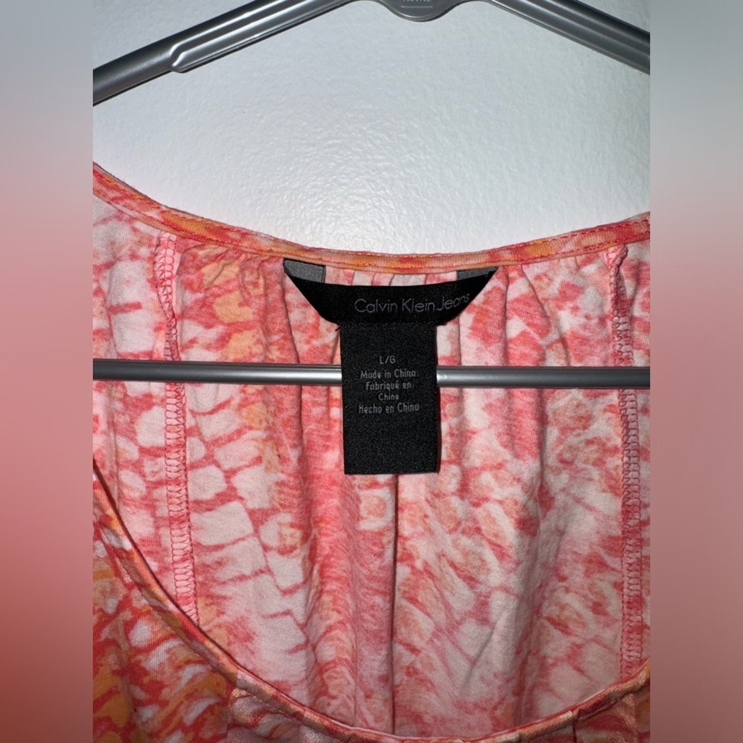 Pre-Owned LG Calvin Klein Jeans Orange Print Short Sleeve Top