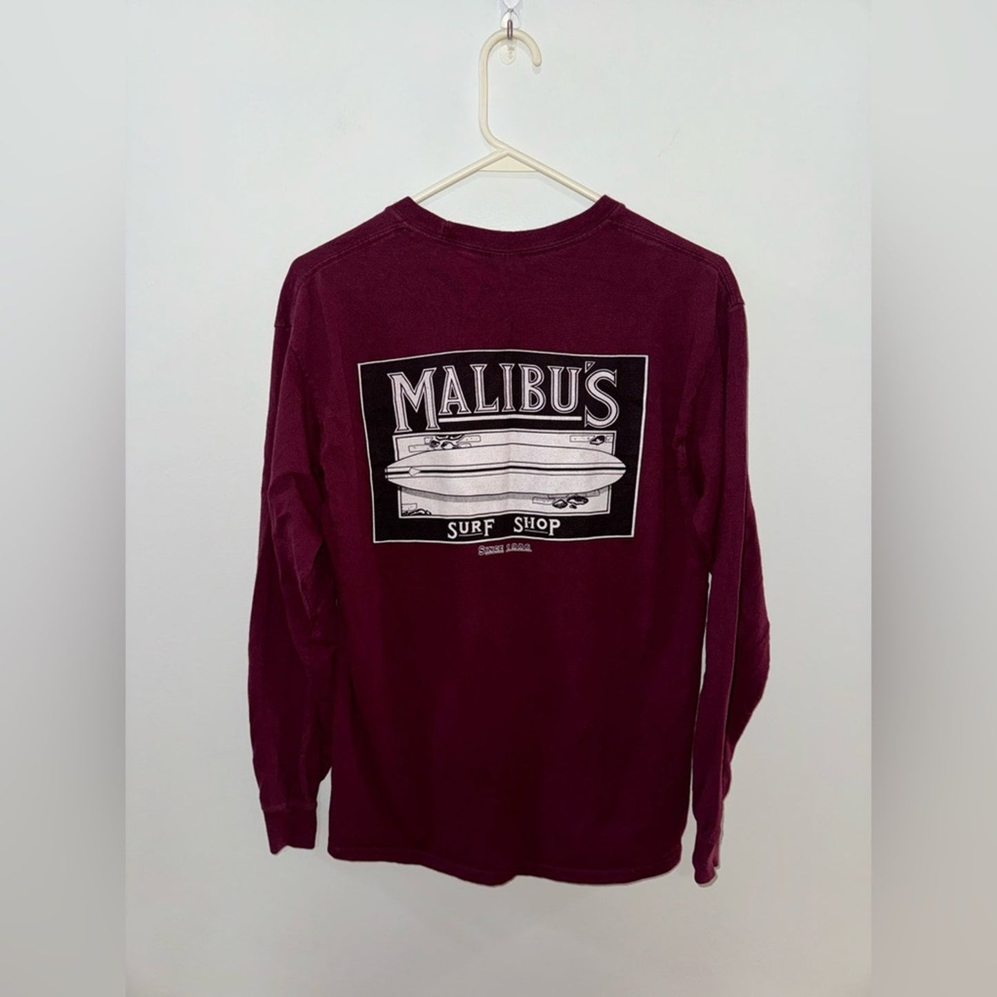 MD Unisex Malibu’s Surf Shop Maroon Surfboard Graphic Long Sleeve Shirt