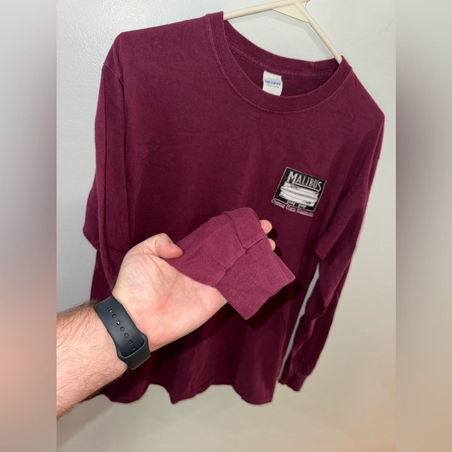 MD Unisex Malibu’s Surf Shop Maroon Surfboard Graphic Long Sleeve Shirt