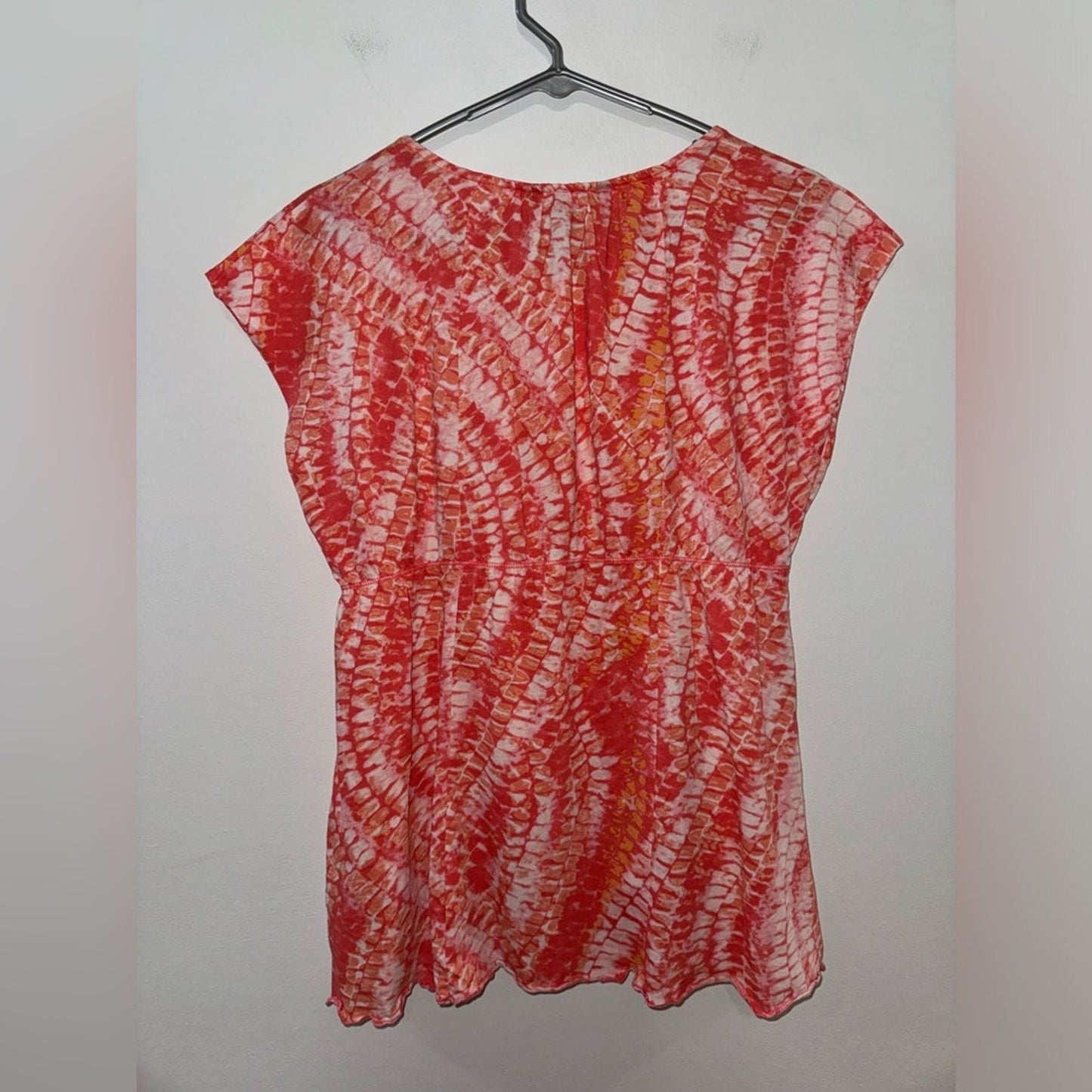 Pre-Owned LG Calvin Klein Jeans Orange Print Short Sleeve Top