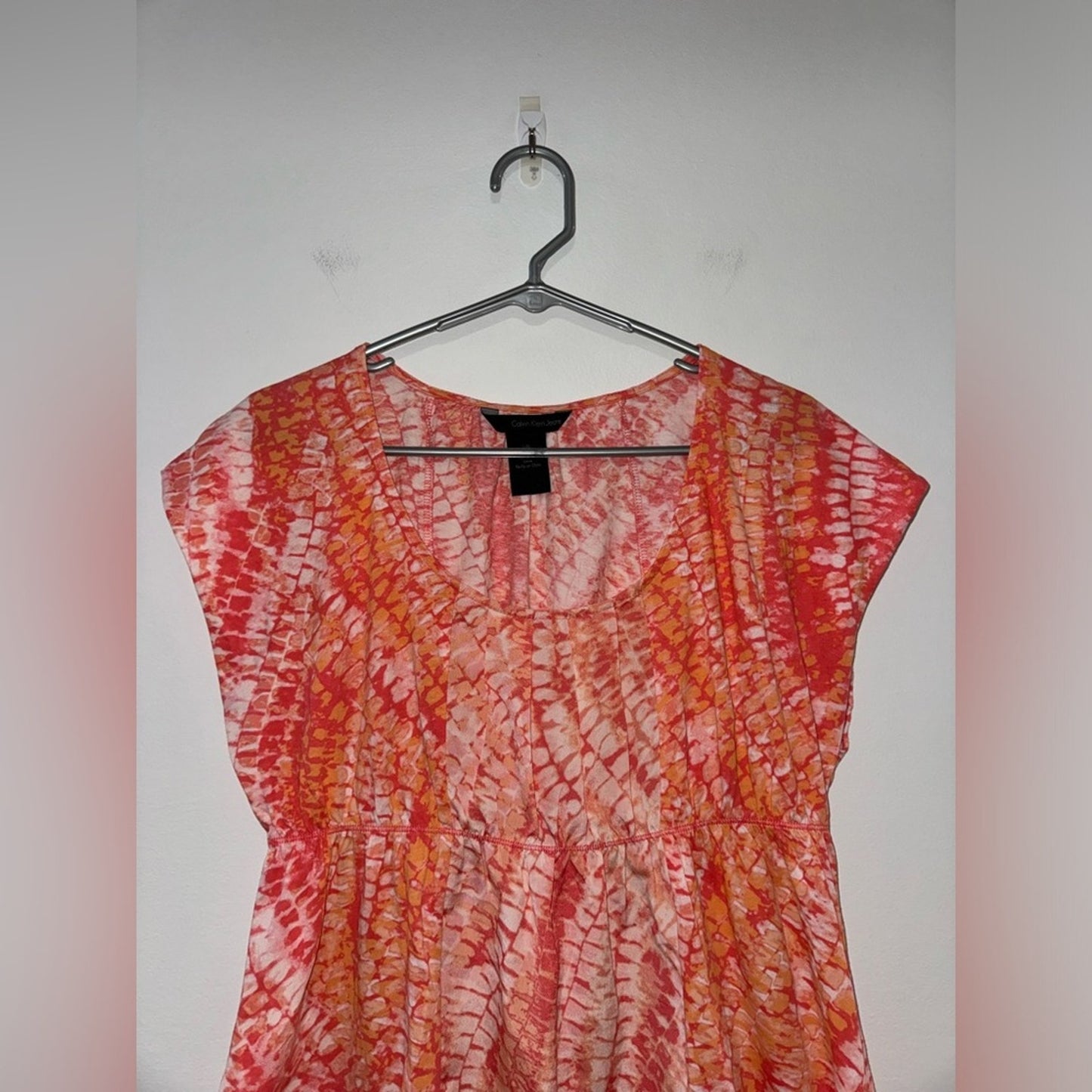 Pre-Owned LG Calvin Klein Jeans Orange Print Short Sleeve Top