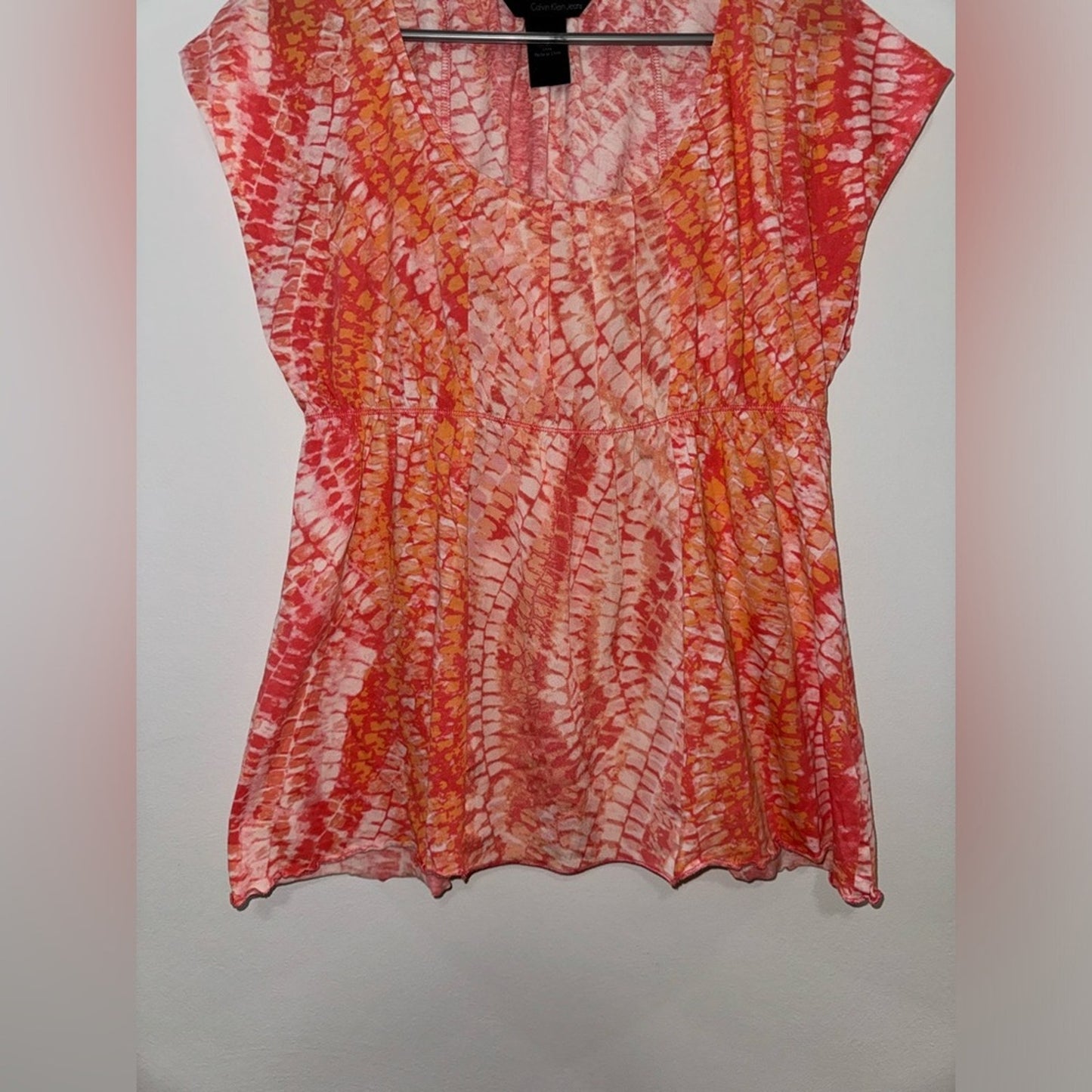 Pre-Owned LG Calvin Klein Jeans Orange Print Short Sleeve Top